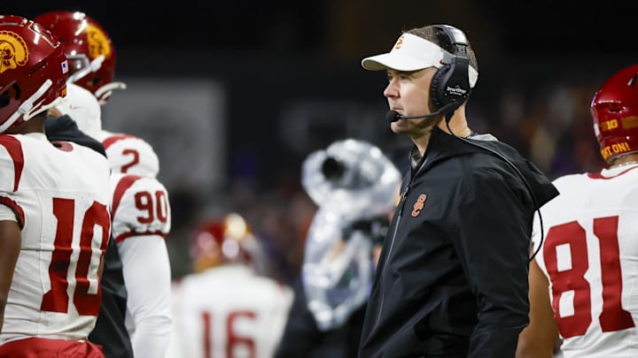 Nov 2, 2024; Seattle, Washington, USA; USC Trojans head coach Lincoln Riley stands on the sideline during the fourth quarter against the Washington Huskies at Alaska Airlines Field at Husky Stadium. Mandatory Credit: Joe Nicholson-Imagn Images Nov 2, 2024; Seattle, Washington, USA; USC Trojans head coach Lincoln Riley stands on the sideline during the fourth quarter against the Washington Huskies at Alaska Airlines Field at Husky Stadium. Mandatory Credit: Joe Nicholson-Imagn Images