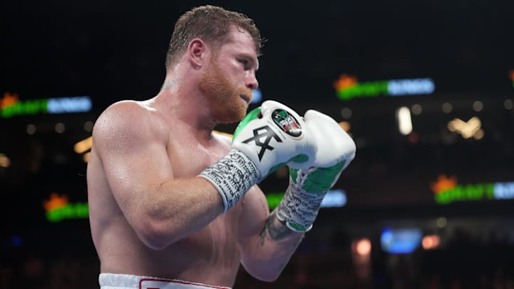 Canelo Alvarez (red trunks) and Gennadiy Golovkin (white trunks) box during a super middleweight championship bout at T-Mobile Arena. 