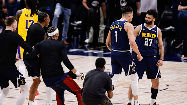 Apr 29, 2024; Denver, Colorado, USA; Denver Nuggets guard Jamal Murray (27) reacts 