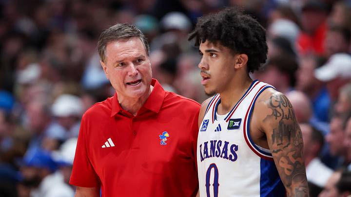 Oct 25, 2026; Lawrence, Kansas, USA;  Kansas Jayhawks head coach Bill Self talks to Kansas Jayhawks guard Taylen Kinney (0) during a game against the Duke Blue Devils at Allen Fieldhouse.  Mandatory Credit: Scott Sewell-Imagn Images