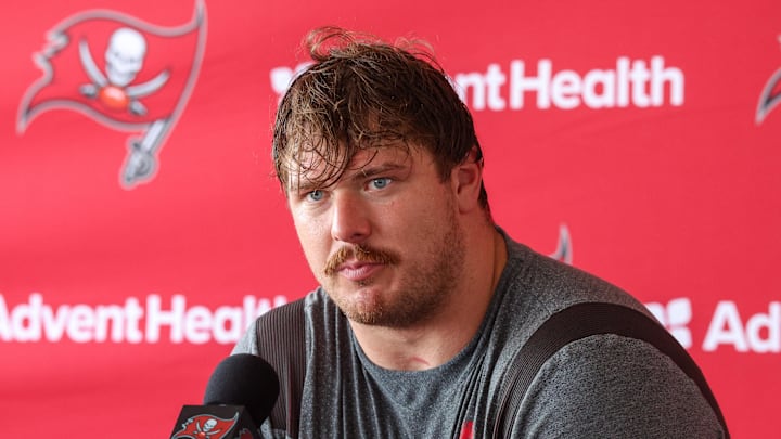 Tampa Bay Buccaneers offensive tackle Luke Goedeke (67) talks to media after training camp.