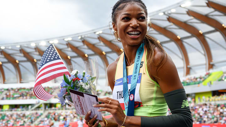 Gabby Thomas celebrates her win in the women’s 200 meter final during the US Olympic Track and Field Team Trials.