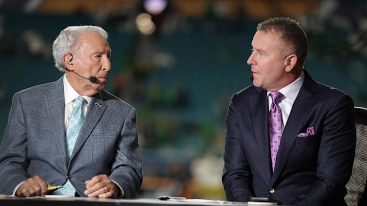 Jan 9, 2025; Miami, FL, USA; ESPN analysts Lee Corso and Kirk Herbstreit before the game between the Notre Dame Fighting Irish and the Penn State Nittany Lions in the Orange Bowl at Hard Rock Stadium. 