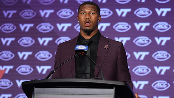 Jul 23, 2024; Virginia Tech quarterback Kyron Drones answers questions from the media during the ACC Kickoff in Charlotte, N.C.