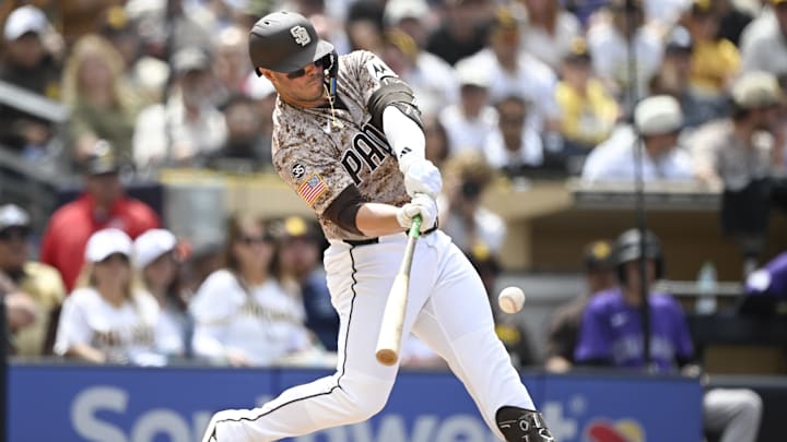Apr 12, 2026; San Diego, California, USA; San Diego Padres first baseman Ty France (25) hits a solo home run during the fourth inning against the Colorado Rockies at Petco Park. Mandatory Credit: Denis Poroy-Imagn Images Apr 12, 2026; San Diego, California, USA; San Diego Padres first baseman Ty France (25) hits a solo home run during the fourth inning against the Colorado Rockies at Petco Park. Mandatory Credit: Denis Poroy-Imagn Images