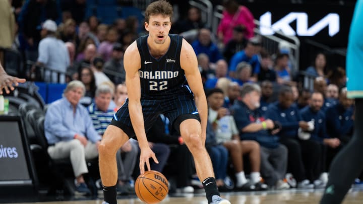 Orlando Magic forward Franz Wagner (22) dribbles the ball against the Charlotte Hornets in the first quarter at KIA Center.