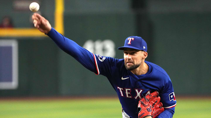 Sep 10, 2024; Phoenix, Arizona, USA; Texas Rangers pitcher Nathan Eovaldi (17) throws against the Arizona Diamondbacks in the first inning at Chase Field. 