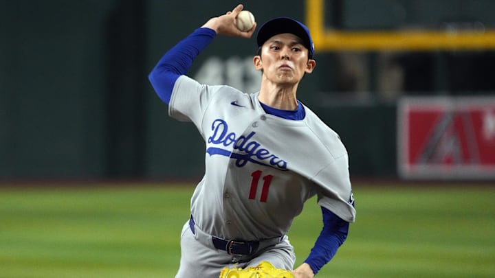 Sep 24, 2025; Phoenix, Arizona, USA; Los Angeles Dodgers pitcher Roki Sasaki throws against the Arizona Diamondbacks in the seventh inning at Chase Field. Mandatory Credit: Rick Scuteri-Imagn Images Sep 24, 2025; Phoenix, Arizona, USA; Los Angeles Dodgers pitcher Roki Sasaki throws against the Arizona Diamondbacks in the seventh inning at Chase Field. Mandatory Credit: Rick Scuteri-Imagn Images