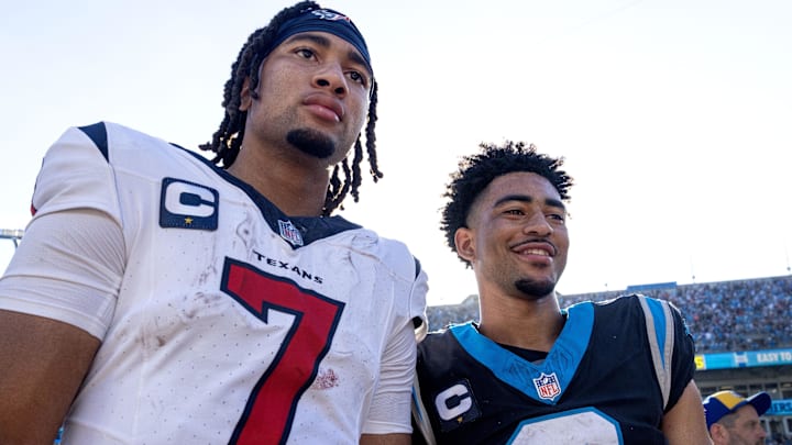 Oct 29, 2023; Charlotte, North Carolina, USA; Houston Texans quarterback C.J. Stroud (7) and Carolina Panthers quarterback Bryce Young (9) after the game at Bank of America Stadium. Mandatory Credit: Bob Donnan-Imagn Images