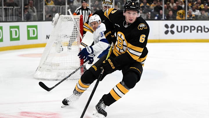 Apr 11, 2026; Boston, Massachusetts, USA; Boston Bruins defenseman Mason Lohrei (6) skates against the Tampa Bay Lightning during the second period at the TD Garden. Mandatory Credit: Brian Fluharty-Imagn Images