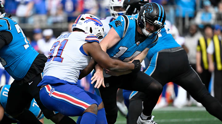 Oct 26, 2025; Charlotte, North Carolina, USA; Buffalo Bills defensive tackle Ed Oliver (91) sacks Carolina Panthers quarterback Andy Dalton (14) Oct 26, 2025; Charlotte, North Carolina, USA; Buffalo Bills defensive tackle Ed Oliver (91) sacks Carolina Panthers quarterback Andy Dalton (14)