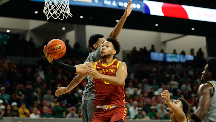 Jan 7, 2026; Waco, Texas, USA;  Iowa State Cyclones forward Joshua Jefferson (5) scores a layup against Baylor Bears center Caden Powell (44) during the first half at Paul and Alejandra Foster Pavilion.