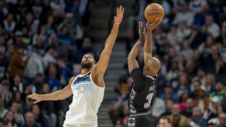 San Antonio Spurs guard Chris Paul shoots the ball over Minnesota Timberwolves center Rudy Gobert in the second half at Target Center in Minneapolis on March 9, 2025. San Antonio Spurs guard Chris Paul shoots the ball over Minnesota Timberwolves center Rudy Gobert in the second half at Target Center in Minneapolis on March 9, 2025.