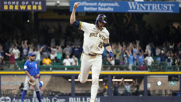 Sep 8, 2026; Milwaukee, Wisconsin, USA; Milwaukee Brewers designated hitter Christian Yelich (22) celebrates as Milwaukee Brewers left fielder Jackson Chourio (11) (not pictured) hits a two run home run to tie the game against the Chicago Cubs in the ninth inning at American Family Field. Mandatory Credit: Michael McLoone-Imagn Images Sep 8, 2026; Milwaukee, Wisconsin, USA; Milwaukee Brewers designated hitter Christian Yelich (22) celebrates as Milwaukee Brewers left fielder Jackson Chourio (11) (not pictured) hits a two run home run to tie the game against the Chicago Cubs in the ninth inning at American Family Field. Mandatory Credit: Michael McLoone-Imagn Images