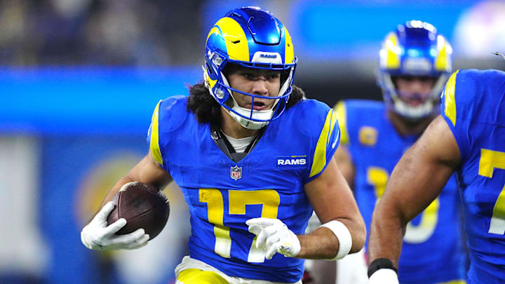 Dec 28, 2024; Inglewood, California, USA; Los Angeles Rams wide receiver Puka Nacua (17) carries the ball against the Arizona Cardinals in the second half at SoFi Stadium. Mandatory Credit: Kirby Lee-Imagn Images