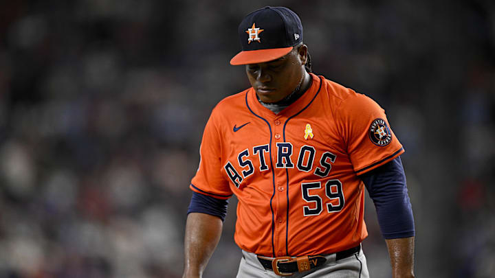 Sep 7, 2025; Arlington, Texas, USA; Houston Astros starting pitcher Framber Valdez (59) looks down as he walks off the field during the game between the Texas Rangers and the Houston Astros at Globe Life Field. Mandatory Credit: Jerome Miron-Imagn Images