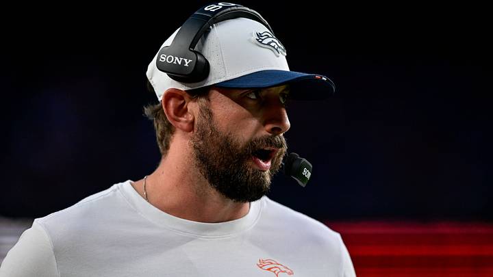 DENVER, CO - AUGUST 16: Denver Broncos quarterbacks coach Davis Webb calls plays vs. the Arizona Cardinals in preseason action.