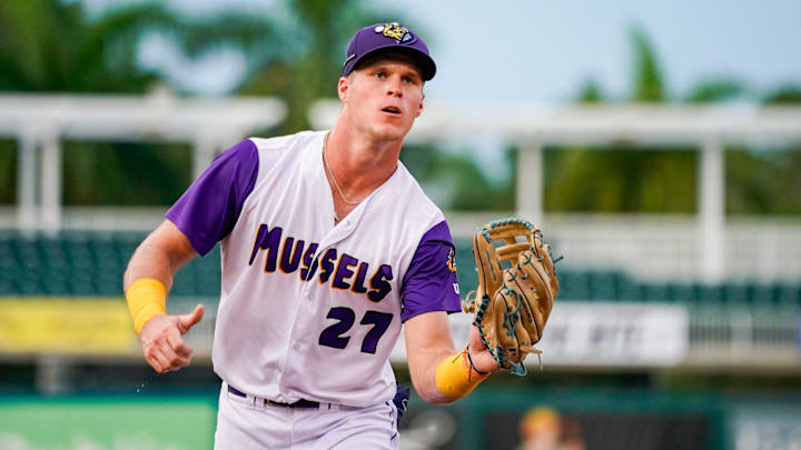Fort Myers Mighty Mussels outfielder Walker Jenkins (27) catches a ball from the dugout during the second inning of a game against the Tampa Tarpons at Hammond Stadium in Fort Myers on Friday, June 28, 2024.