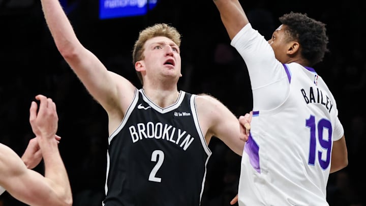 Dec 4, 2025; Brooklyn, New York, USA; Brooklyn Nets forward Danny Wolf (2) shoots the ball against Utah Jazz guard Ace Bailey (19) during the second quarter at Barclays Center. Mandatory Credit: Tom Horak-Imagn Images