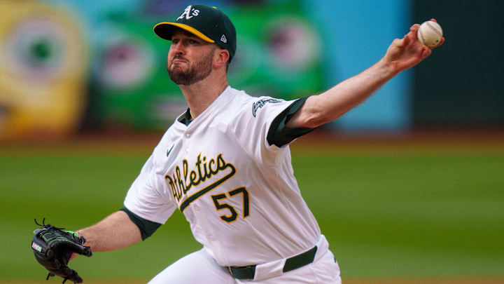 May 6, 2024; Oakland, California, USA; Oakland Athletics starting pitcher Alex Wood (57) delivers a pitch against the Texas Rangers during the first inning at Oakland-Alameda County Coliseum. Mandatory Credit: Neville E. Guard-Imagn Images