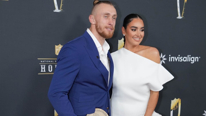George Kittle and Claire Kittle on the red carpet before Super Bowl LIX NFL Honors at Saenger Theatre.
