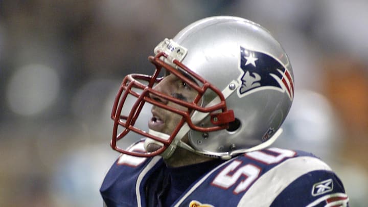 Feb 1, 2004; Houston, TX, USA; FILE PHOTO; New England Patriots linebacker Mike Vrabel (50) reacts after catching a touchdown pass against the Carolina Panthers during Super Bowl XXXVIII at Reliant Stadium. The Patriots defeated the Panthers 32-29. Mandatory Credit: MPS-Imagn Images