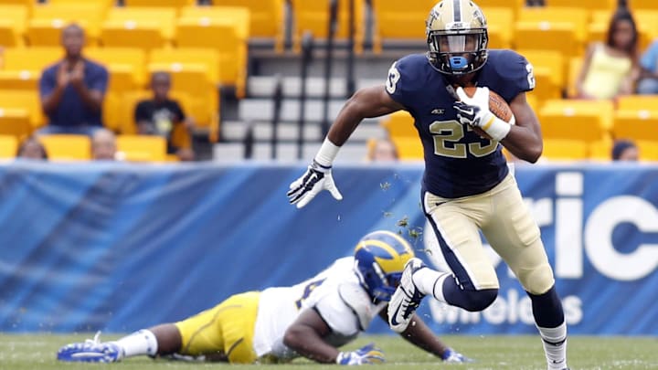 Aug 30, 2014; Pittsburgh, PA, USA; Pittsburgh Panthers wide receiver Tyler Boyd (23) returns a punt against the Delaware Fightin Blue Hens during the first quarter at Heinz Field. PITT won 62-0. Mandatory Credit: Charles LeClaire-Imagn Images