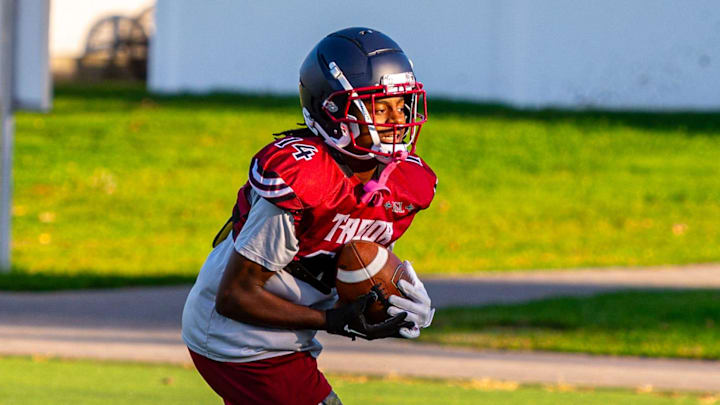 Tabor Academy's Asante Aurora pulls in the reception during practice.