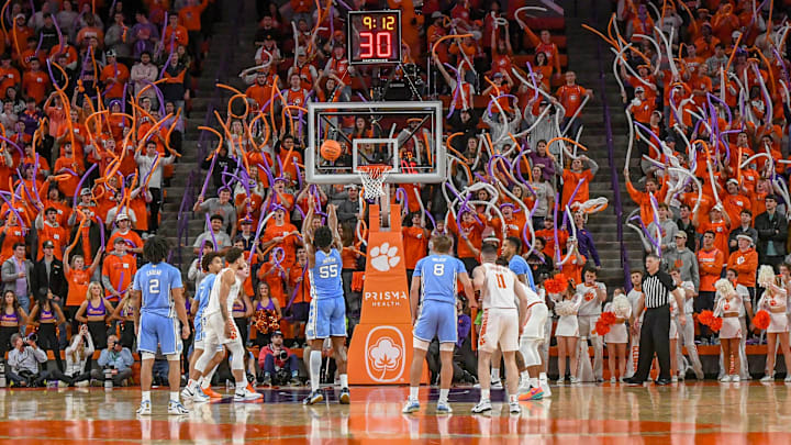 Jan 6, 2024; Clemson, South Carolina, USA; University of North Carolina forward Harrison Ingram (55) misses a free throw as Clemson fans wave orange white and purple balloons in the crowd during the second half at Littlejohn Coliseum. Mandatory Credit: Ken Ruinard-Imagn Images