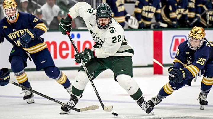 Michigan State's Isaac Howard moves the puck against Notre Dame during the second period in the Big Ten tournament on Saturday, March 15, 2025, at Muni Arena in East Lansing.
