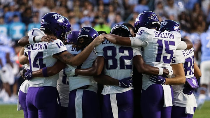 TCU wide receivers gather before kickoff against the UNC Tar Heels in Chapel Hill, North Carolina. TCU wide receivers gather before kickoff against the UNC Tar Heels in Chapel Hill, North Carolina.