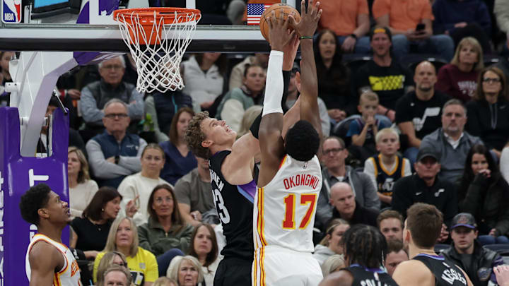 Jan 7, 2025; Salt Lake City, Utah, USA; Atlanta Hawks forward Onyeka Okongwu (17) blocks the shot of Utah Jazz forward Lauri Markkanen (23) during the first quarter at Delta Center. Mandatory Credit: Chris Nicoll-Imagn Images Jan 7, 2025; Salt Lake City, Utah, USA; Atlanta Hawks forward Onyeka Okongwu (17) blocks the shot of Utah Jazz forward Lauri Markkanen (23) during the first quarter at Delta Center. Mandatory Credit: Chris Nicoll-Imagn Images