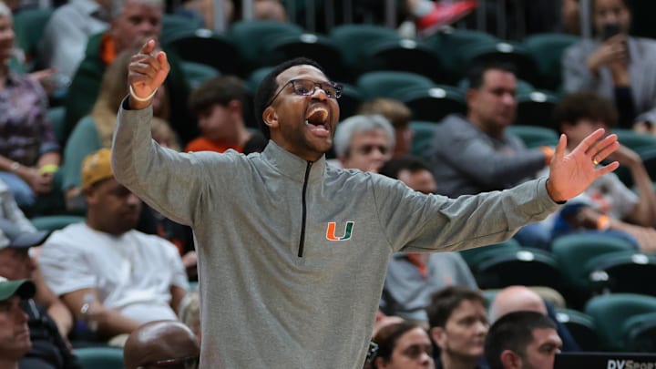 Nov 3, 2025; Coral Gables, Florida, USA; Miami Hurricanes head coach Jai Lucas reacts against the Jacksonville Dolphins during the second half at Watsco Center. Mandatory Credit: Sam Navarro-Imagn Images