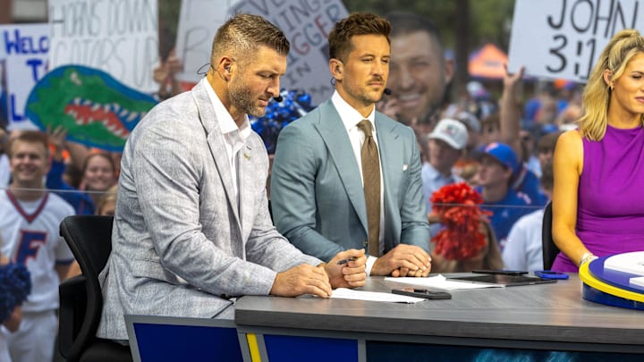 Former Gator quarterback Tim Tebow, left, Along with Ryan McKee and rest of the ESPN SEC Nation panel do their show from Plaza of the Americas in Gainesville, FL on Saturday, October 4, 2025. [Alan Youngblood/Gainesville Sun]