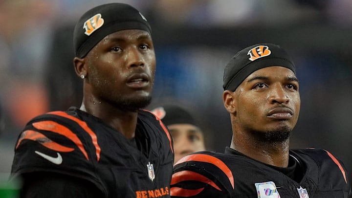 Cincinnati Bengals wide receiver Tee Higgins (5) and wide receiver Ja'Marr Chase (1) watch the score board as their team lose to the Detroit Lions 24-37 at Paycor Stadium on October 5, 2025.