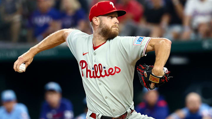 Aug 10, 2025; Arlington, Texas, USA;  Philadelphia Phillies starting pitcher Zack Wheeler (45) throws during the first inning against the Texas Rangers at Globe Life Field.