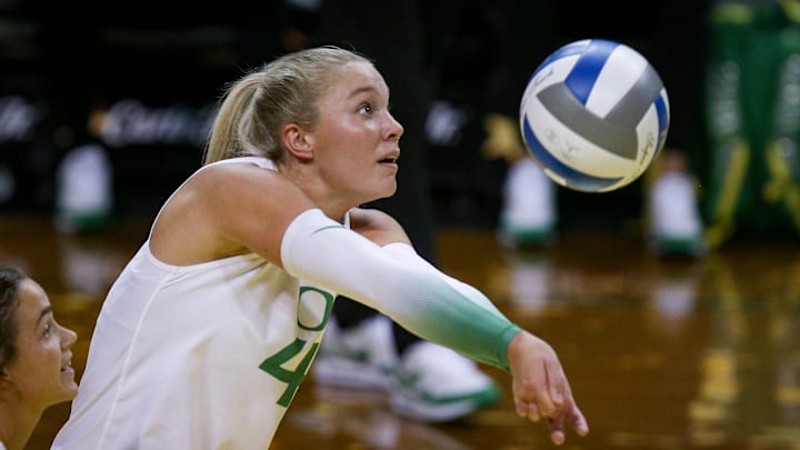 Oregon outside hitter Daley McClellan sets the ball as Oregon volleyball takes on Portland State in an exhibition match Saturday, Aug. 19, 2023, at Matthew Knight Arena in Eugene.