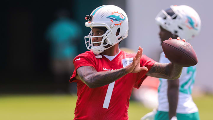 Miami Dolphins quarterback Tua Tagovailoa (1) throws the football during mandatory minicamp at Hard Rock Stadium. 