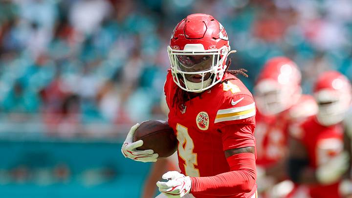 Kansas City Chiefs wide receiver Rashee Rice (4) runs with the ball against the Miami Dolphins in the fourth quarter at Hard Rock Stadium. 