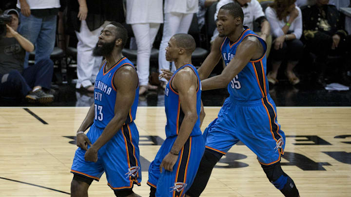 June 4, 2012; San Antonio, TX, USA; Oklahoma City Thunder guards James Harden (13) and Russell Westbrook (center) and forward Kevin Durant (35) react against the San Antonio Spurs during the second half in game five of the Western Conference finals of the 2012 NBA playoffs at the AT&T Center. Oklahoma City beat San Antonio 108-106. Mandatory Credit: Brendan Maloney-Imagn Images