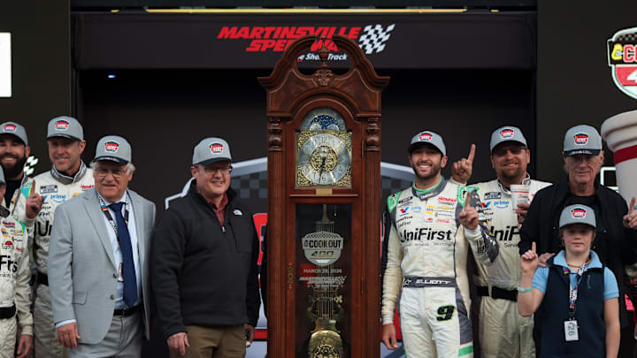 Chase Elliott is presented with the grandfather clock, the traditional Martinsville Speedway trophy, for winning the Cook Out 400. Chase Elliott is presented with the grandfather clock, the traditional Martinsville Speedway trophy, for winning the Cook Out 400.