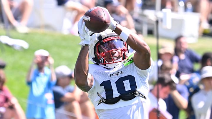 New England Patriots wide receiver Kyle Williams (18) makes a catch during training camp at Gillette Stadium. 