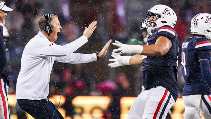 Oct 11, 2025; Tucson, Arizona, USA; Arizona Wildcats head coach Brent Brennan celebrates a blocked field goal during the second quarter of the game against the Brigham Young Cougars at Arizona Stadium. Mandatory Credit: Aryanna Frank-Imagn Images Oct 11, 2025; Tucson, Arizona, USA; Arizona Wildcats head coach Brent Brennan celebrates a blocked field goal during the second quarter of the game against the Brigham Young Cougars at Arizona Stadium. Mandatory Credit: Aryanna Frank-Imagn Images