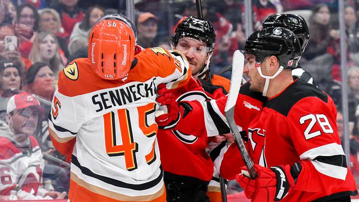 Oct 22, 2026; Newark, New Jersey, USA; New Jersey Devils defenseman Brett Pesce (22) and Anaheim Ducks right wing Beckett Sennecke (45) fight during the third period at Prudential Center. Mandatory Credit: John Jones-Imagn Images Oct 22, 2026; Newark, New Jersey, USA; New Jersey Devils defenseman Brett Pesce (22) and Anaheim Ducks right wing Beckett Sennecke (45) fight during the third period at Prudential Center. Mandatory Credit: John Jones-Imagn Images