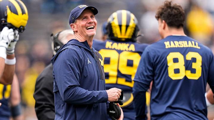 Michigan defensive coordinator Jay Hill celebrates a play during the spring game at Michigan Stadium in Ann Arbor on Saturday, April 18, 2026.