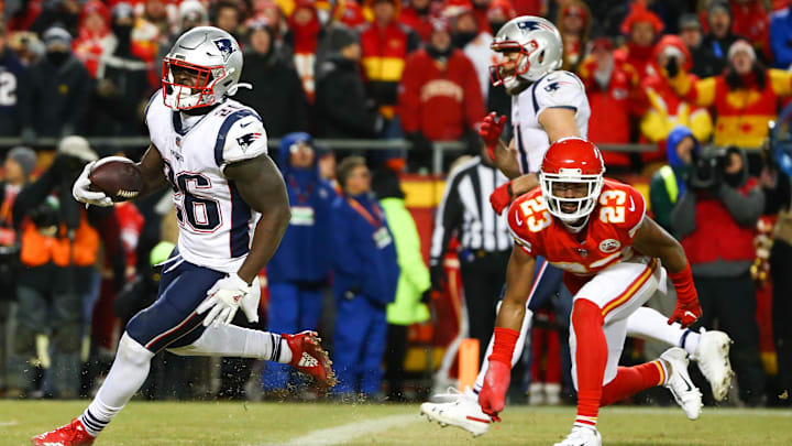 Jan 20, 2019; Kansas City, MO, USA; New England Patriots running back Sony Michel (26) runs the ball for a touchdown ahead ofKansas City Chiefs cornerback Kendall Fuller (23) during the second half of the AFC Championship game at Arrowhead Stadium. Mandatory Credit: Jay Biggerstaff-Imagn Images Jan 20, 2019; Kansas City, MO, USA; New England Patriots running back Sony Michel (26) runs the ball for a touchdown ahead ofKansas City Chiefs cornerback Kendall Fuller (23) during the second half of the AFC Championship game at Arrowhead Stadium. Mandatory Credit: Jay Biggerstaff-Imagn Images