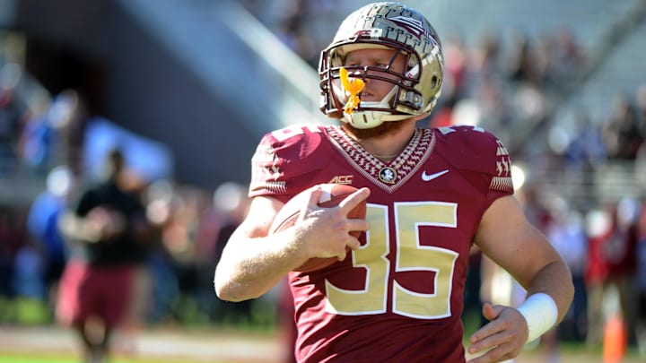 Nov 29, 2014; Tallahassee, FL, USA; Florida State Seminoles tight end Nick O'Leary (35) warms up before the start of the game against the Florida Gators at Doak Campbell Stadium. Mandatory Credit: Melina Vastola-Imagn Images