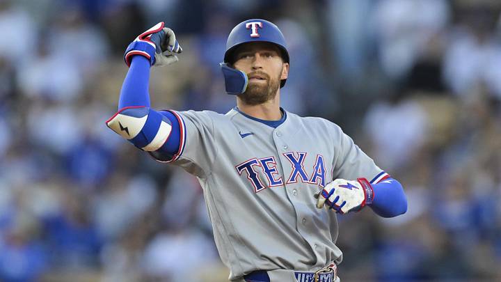 Apr 11, 2026; Los Angeles, California, USA; Texas Rangers left fielder Brandon Nimmo (24) reacts after a double against the Los Angeles Dodgers during the third inning at Dodger Stadium. Mandatory Credit: Jayne Kamin-Oncea-Imagn Images