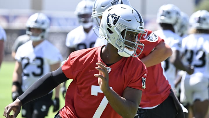 Jun 10, 2025; Henderson, NV, USA; Las Vegas Raiders quarterback Geno Smith (7) performs a drill during Las Vegas Raiders Minicamp at Intermountain Health Performance Center. 