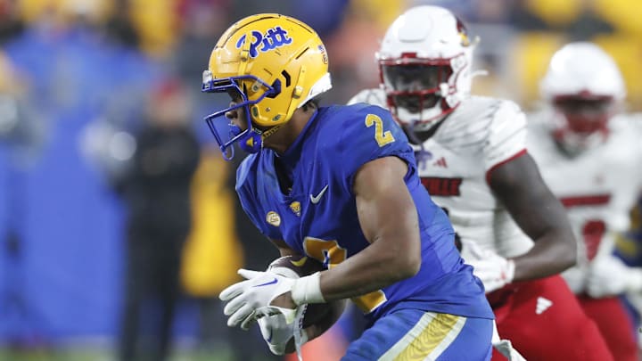 Oct 14, 2023; Pittsburgh, Pennsylvania, USA; Pittsburgh Panthers wide receiver Kenny Johnson (2) runs after a  catch against the Louisville Cardinals during the third quarter at Acrisure Stadium. Pittsburgh won 38-21. Mandatory Credit: Charles LeClaire-Imagn Images